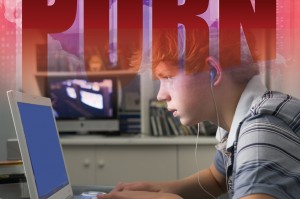 Image of youth looking at laptop computer