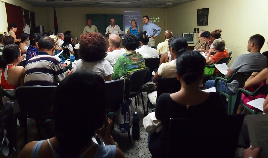 Moody (top right) participates in a presentation on the DSM-5 to faculty and students in the School of Psychology at the University of Havana in May 2013.