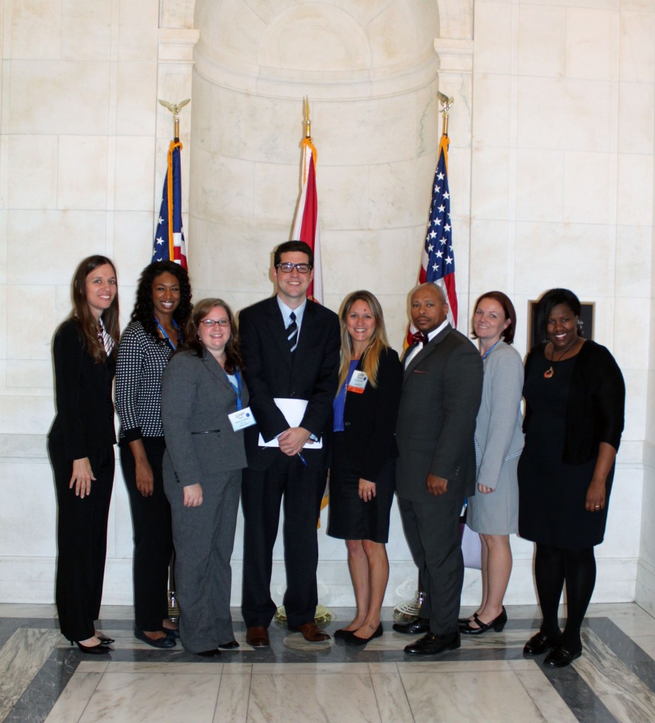 ACA member-leaders from Florida stand with Eduardo Sacasa (center, in necktie), a legislative correspondent in Sen. Marco Rubio's office.