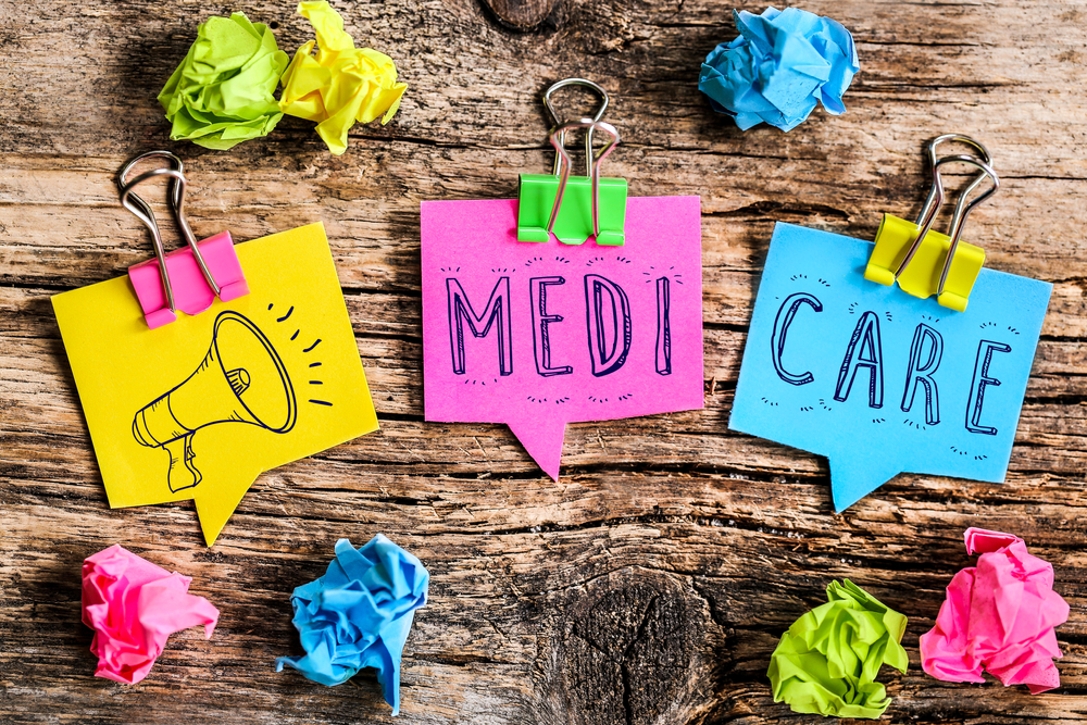 Colorful bubbles shaped paper with the a megaphone icon and the word "Medicare"